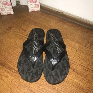 Michael Kors flip flops black size 7